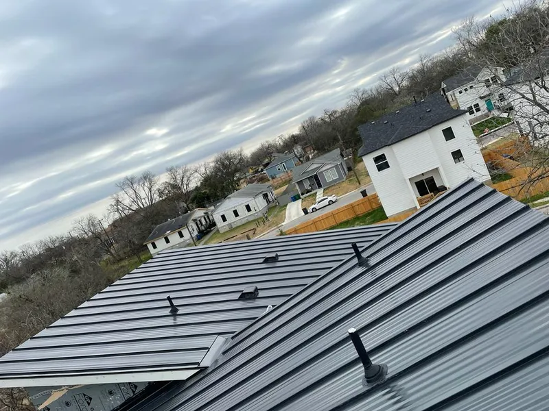 Standing seam metal roof panels with vents for Skylight Repair in Pecan Grove